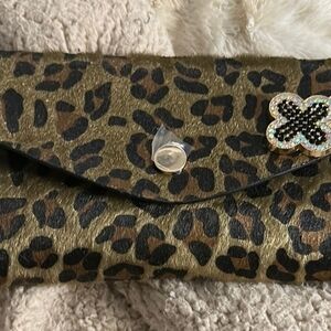 Elegant Leopard Print Clutch with Gold and Black Details